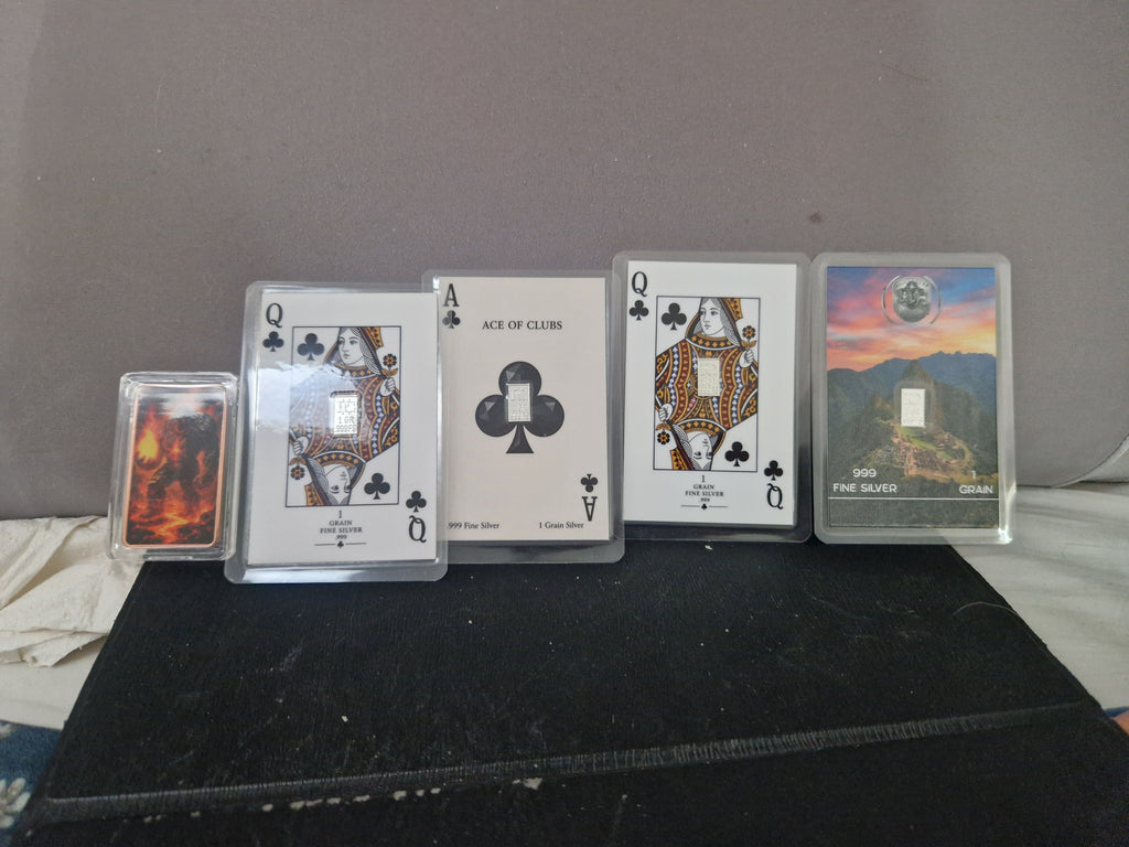 AMixed selection of highly collectable playing cards with grains of silver. And 1oz pure Copper.