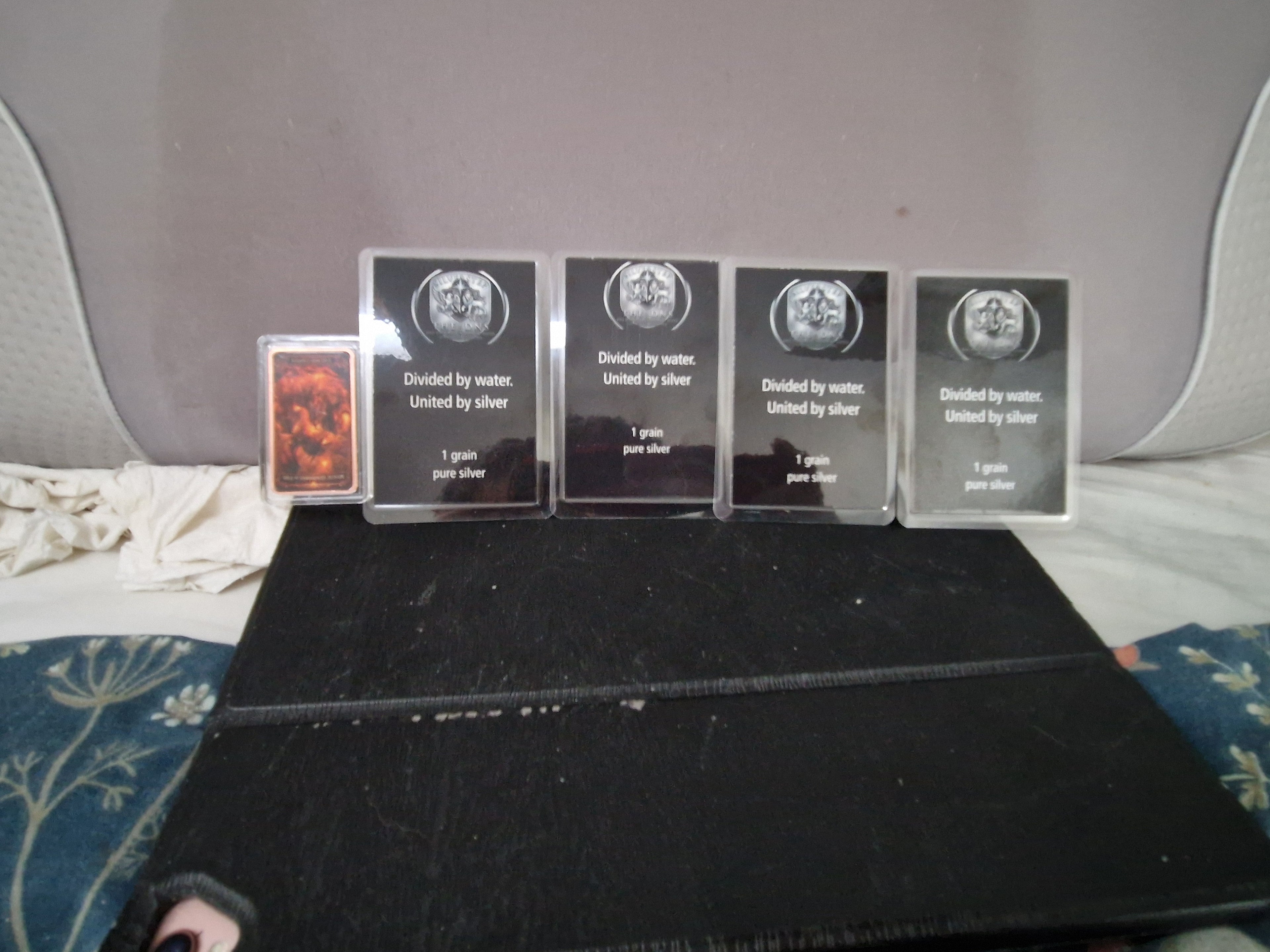 AMixed selection of highly collectable playing cards with grains of silver. And 1oz pure Copper.