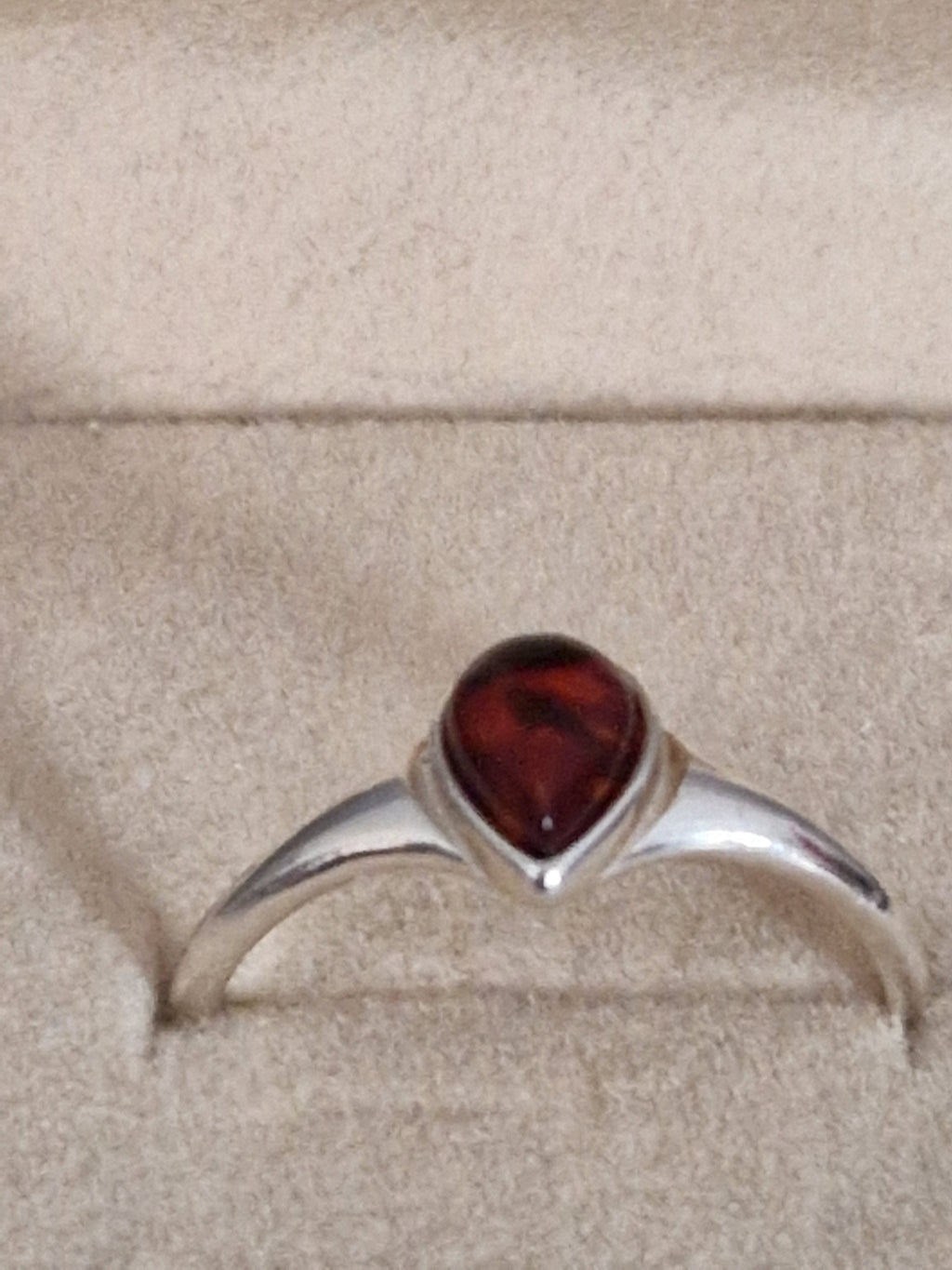 A Beautiful 925 Hallmarked Silver Ring. With a Amber insert. Size Q.