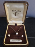 Sterling Silver, Cultered Pearl Necklace &Stud earrings Set in a lovely box.