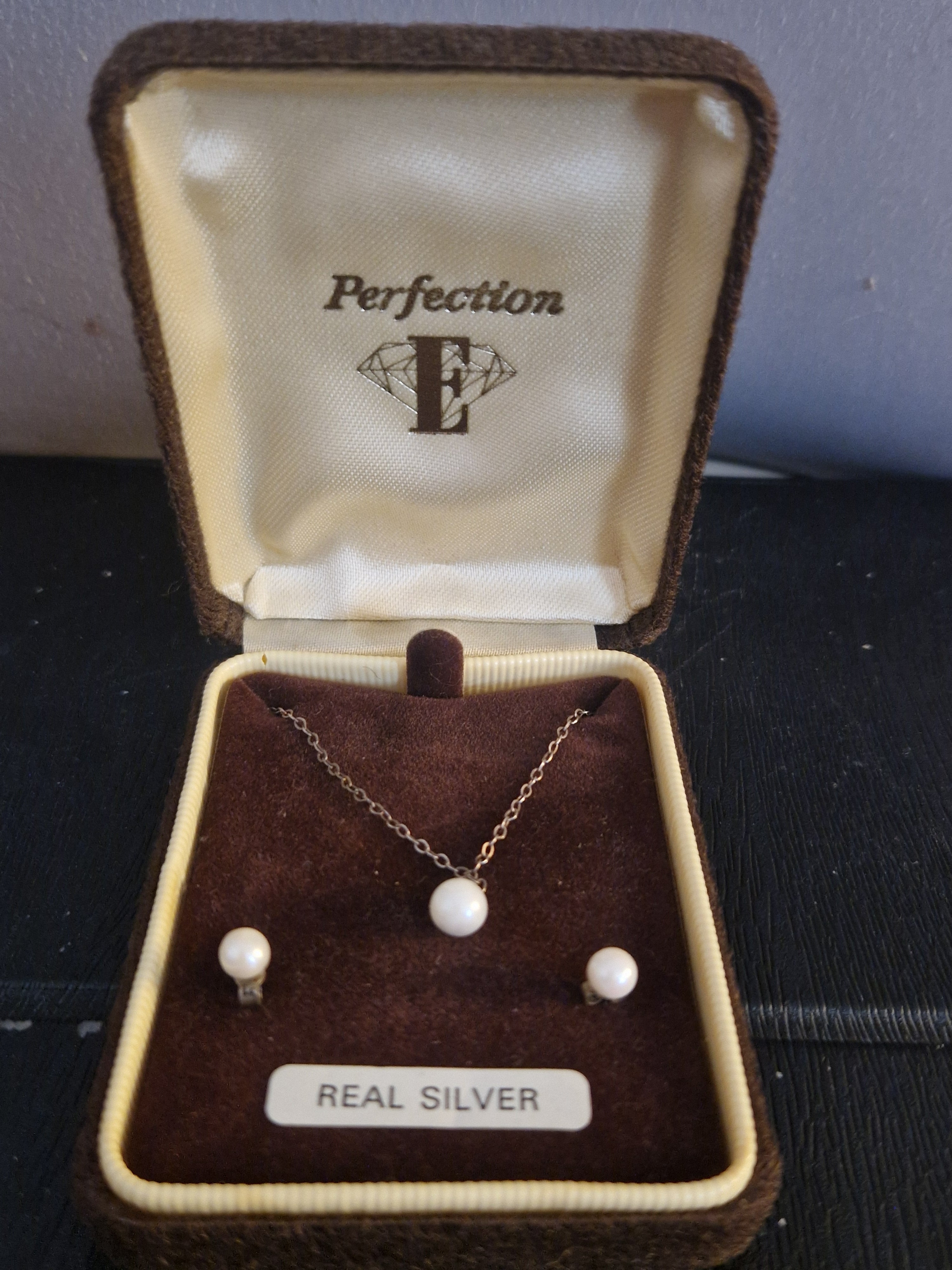 Sterling Silver, Cultered Pearl Necklace &Stud earrings Set in a lovely box.