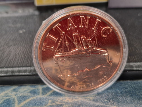 A 1/1000th of 24ct Gold.  1 grain of fine silver. & 1oz of Pure Copper.