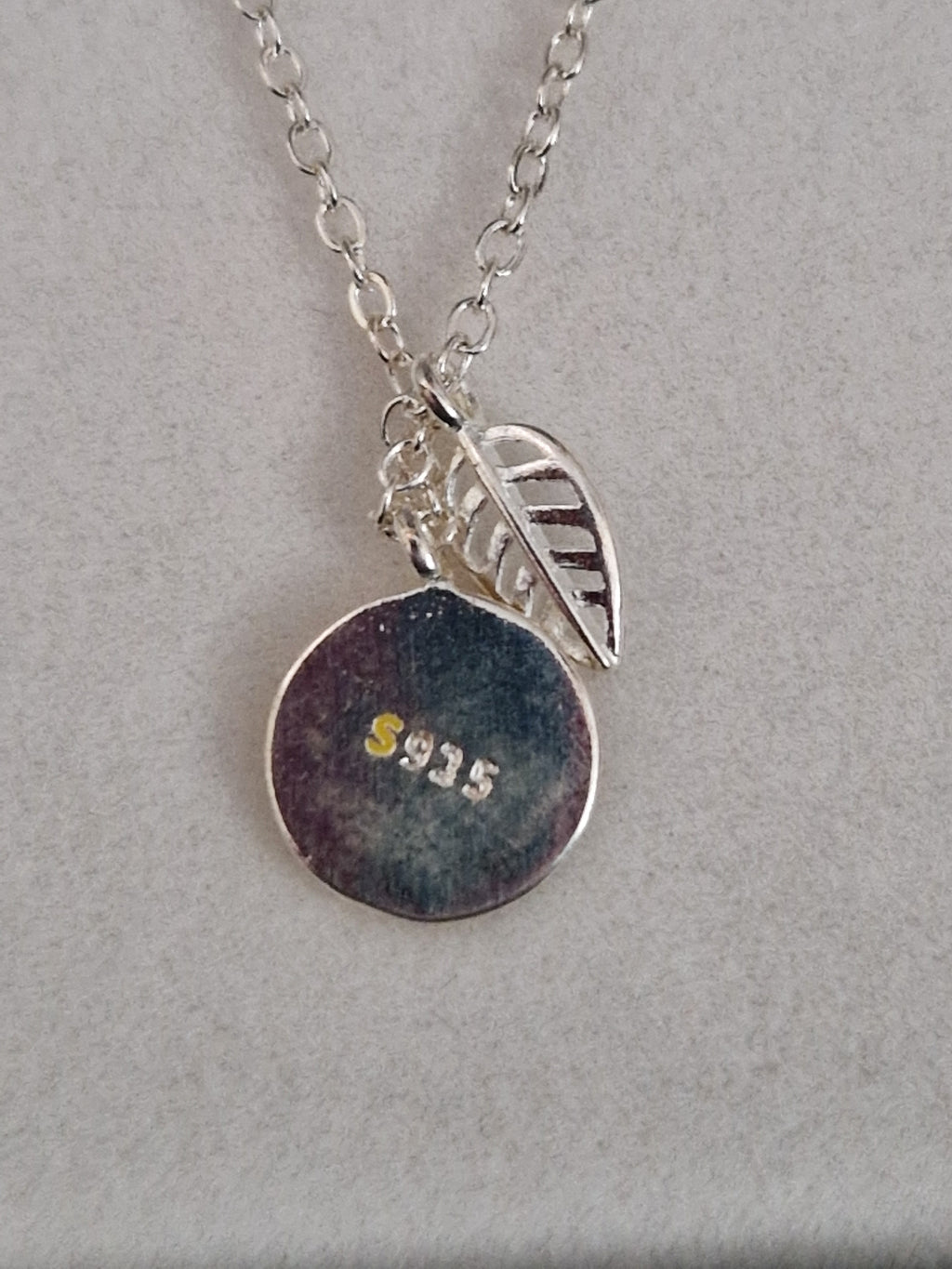 A Beautiful Slice of Lemon with leaf. Hallmarked Silver Necklace. 18 inches.
