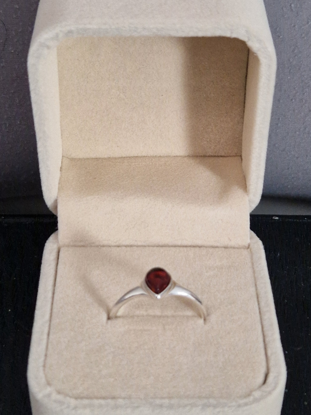 A Beautiful 925 Hallmarked Silver Ring. With a Amber insert. Size Q.