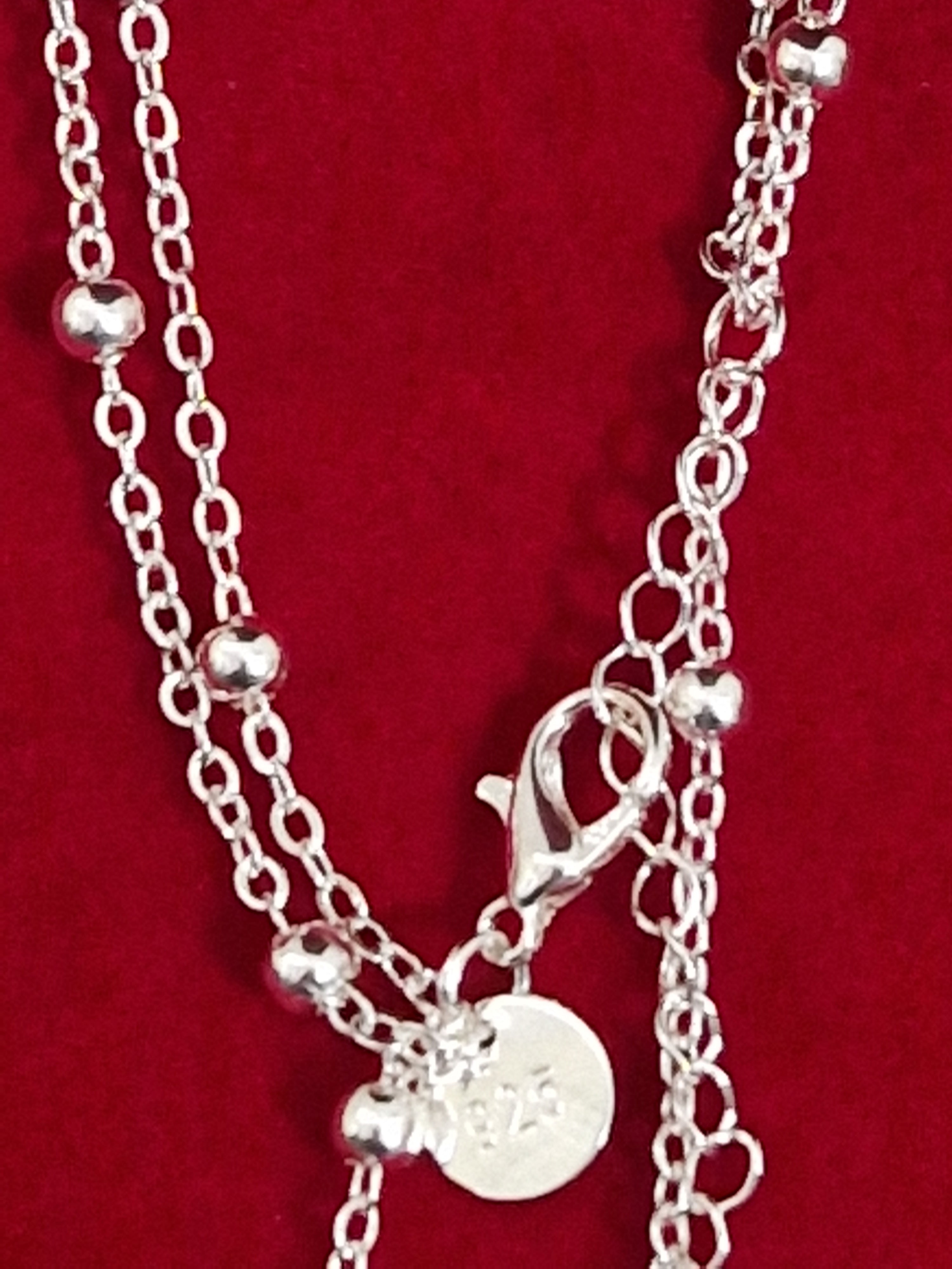 A Solid Hallmarked 925 Silver Double Chain Bracelet.