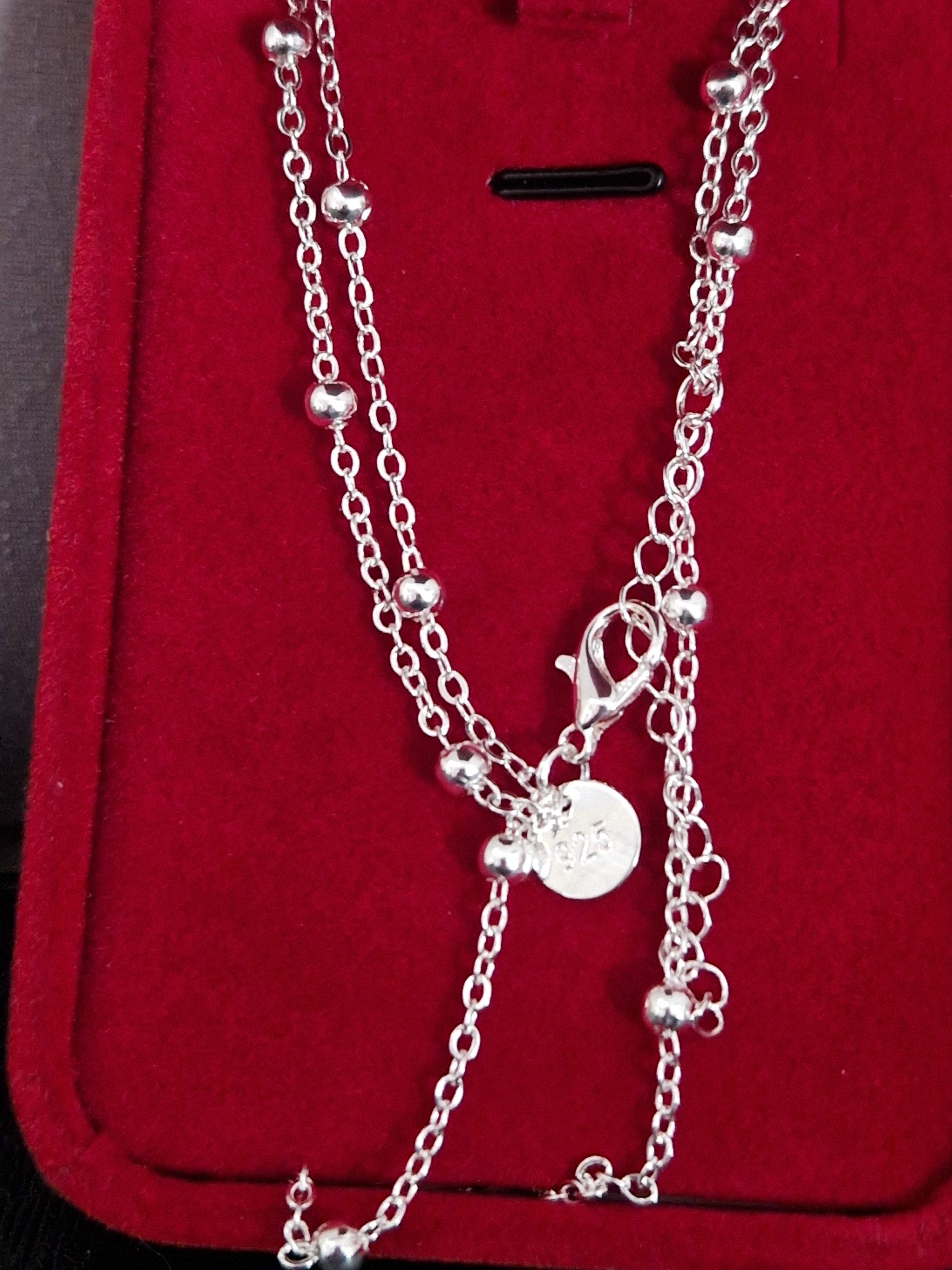 A Solid Hallmarked 925 Silver Double Chain Bracelet.